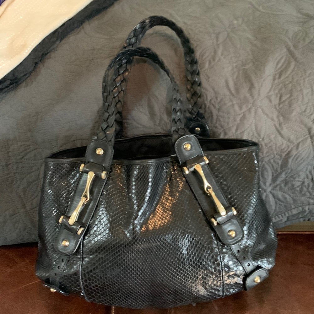 Black snake skin Gucci bag in excellent condition.